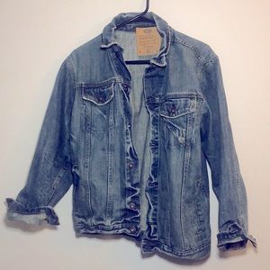 Distressed jean jacket.